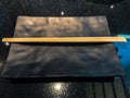 Empty plate and chopsticks over black textured table Royalty Free Stock Photo