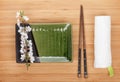 Empty plate, chopsticks and sakura branch Royalty Free Stock Photo