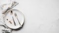 Empty Plate After Meal with Fork and Spoon, Crumbs, and Napkin Royalty Free Stock Photo