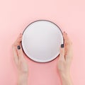 Empty plate in female hands mockup Royalty Free Stock Photo