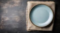 Empty Plate Flat Lay on Textured Dark Background Royalty Free Stock Photo