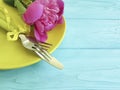 Empty plate flower peony design birthday romantic on blue wooden background