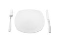 Empty plate, fork and knife on white background Royalty Free Stock Photo