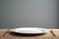 Empty plate with fork and knife on wooden table. Served cutlery, minimal table setting. Menu mockup, space for text, diet concept