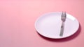 Empty plate with fork on pink background. Served cutlery, minimal table setting. Menu mockup, space for text, diet concept. AI