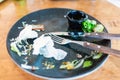 Empty plate left after dinner.Dirty dish after eaten with knife and fork Royalty Free Stock Photo
