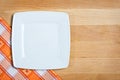 Empty plate over wooden background Royalty Free Stock Photo