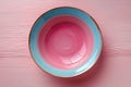 Empty plate on pink background, intermittent fasting concept. Royalty Free Stock Photo