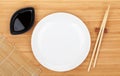 Empty plate, sushi chopsticks and soy sauce Royalty Free Stock Photo