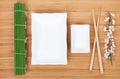 Empty plates, chopsticks and sakura branch Royalty Free Stock Photo