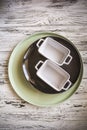 Empty plates and dishes for baking on a white wooden table closeup and copy space Royalty Free Stock Photo