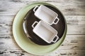 Empty plates and dishes for baking on a white wooden table closeup and copy space Royalty Free Stock Photo