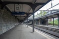 Empty platform with clock and sign at midtown train station in Zurich