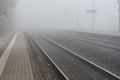 Empty platform on a foggy day