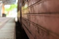 Empty platform of a railway station in Sri Lanka. Old rusty train cars. It looks like an abandoned place, but its not Royalty Free Stock Photo