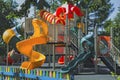 Empty playground in a city park on a hot sunny summer day. Royalty Free Stock Photo