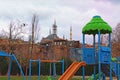 Empty playground is waiting little kids. Famous Sultan Ahmed Mosque in the background. Cloudy day in Istanbul, Turkey