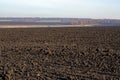 Empty plowed field prepared for the new crop, black soil Royalty Free Stock Photo