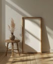 Empty poster frame leaning against a wall in a bohemian interior Royalty Free Stock Photo