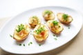 empty potato skins on a white plate with a parsley garnish Royalty Free Stock Photo
