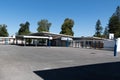 Empty preschool building schoolyard building exterior with playground on a sunny day Royalty Free Stock Photo