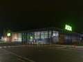 The empty and quiet Parking lot and ASDA Store on New Years Night at Forfar. Royalty Free Stock Photo