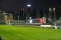 Empty race track and skyline background, Horse racing course in Hong Kong Jockey Club, Happy Valley Royalty Free Stock Photo