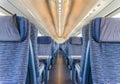 Empty rail passenger carriage seat rows with dimishing perspective Royalty Free Stock Photo