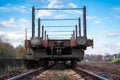 Empty railway freight wagon. on the railway track. Front view Royalty Free Stock Photo