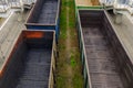 Empty railway gondola cars for transportation of bulk cargo Royalty Free Stock Photo