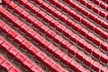 Empty ranges of red seats in a stadium Royalty Free Stock Photo