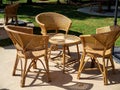 Empty rattan furniture, outdoor garden weave table set. Royalty Free Stock Photo