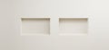 Empty rectangle niche in white wall.