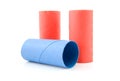 Empty red and blue toilet paper rolls