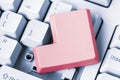 Empty red button removed from computer keyboard Royalty Free Stock Photo