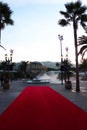 An empty Red carpet at the main entrance of Universal Studio overlooking the famous Universal Studio symbol