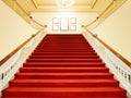 Empty red carpet with white luxury stairs with spotlight Royalty Free Stock Photo