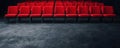 Empty Red Chairs Arranged in Rows in an Indoor Theatre Setting Royalty Free Stock Photo