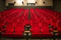 Empty red cinema hall seats, chairs. Perspective view 08.03.2019 Brovary, Ukraine Royalty Free Stock Photo