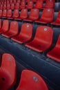 Empty red seats in a sports stadium Royalty Free Stock Photo