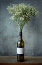 Empty red wine Glass bottles and flower Royalty Free Stock Photo