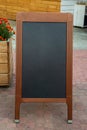 Empty restaurant menu blackboard on the street, menu chalkboard mockup, menu board template Royalty Free Stock Photo