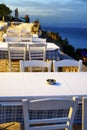 Empty restaurants with terrace in the street in Afytos, Greece Royalty Free Stock Photo