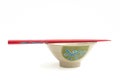 Empty rice bowl with red chopsticks Royalty Free Stock Photo