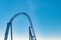 Empty ride roller coaster on sky background in amusement park Royalty Free Stock Photo