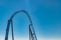 Empty ride roller coaster on sky background in amusement park Royalty Free Stock Photo