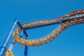 Empty ride roller coaster on sky background in amusement park Royalty Free Stock Photo