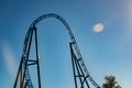 Empty ride roller coaster on sky background in amusement park Royalty Free Stock Photo