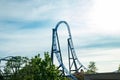 Empty ride roller coaster on sky background in amusement park Royalty Free Stock Photo