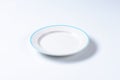 Empty rimmed dinner plate Royalty Free Stock Photo